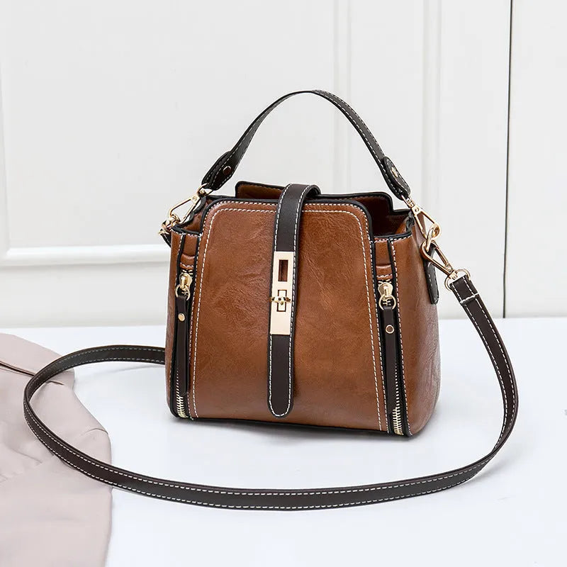 Faux leather women shoulder bag in green with detachable adjustable strap and turn-lock closure