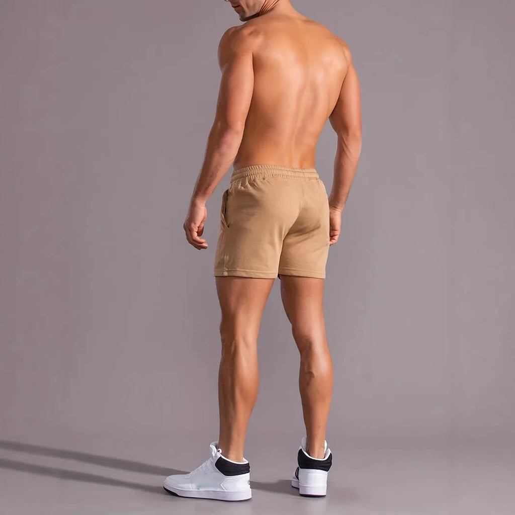 Men's khaki coconut print sports shorts with straight cut design and micro-elastic polyester fabric