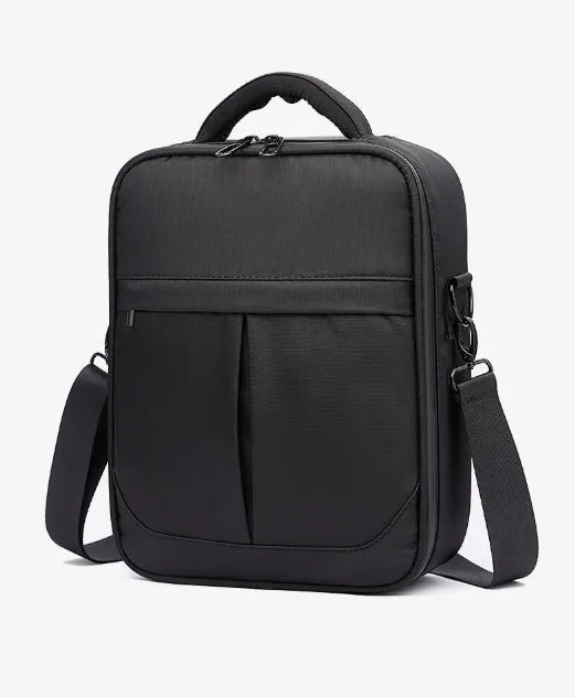 Black oxford fabric men's messenger bag with shoulder strap and carry handle.