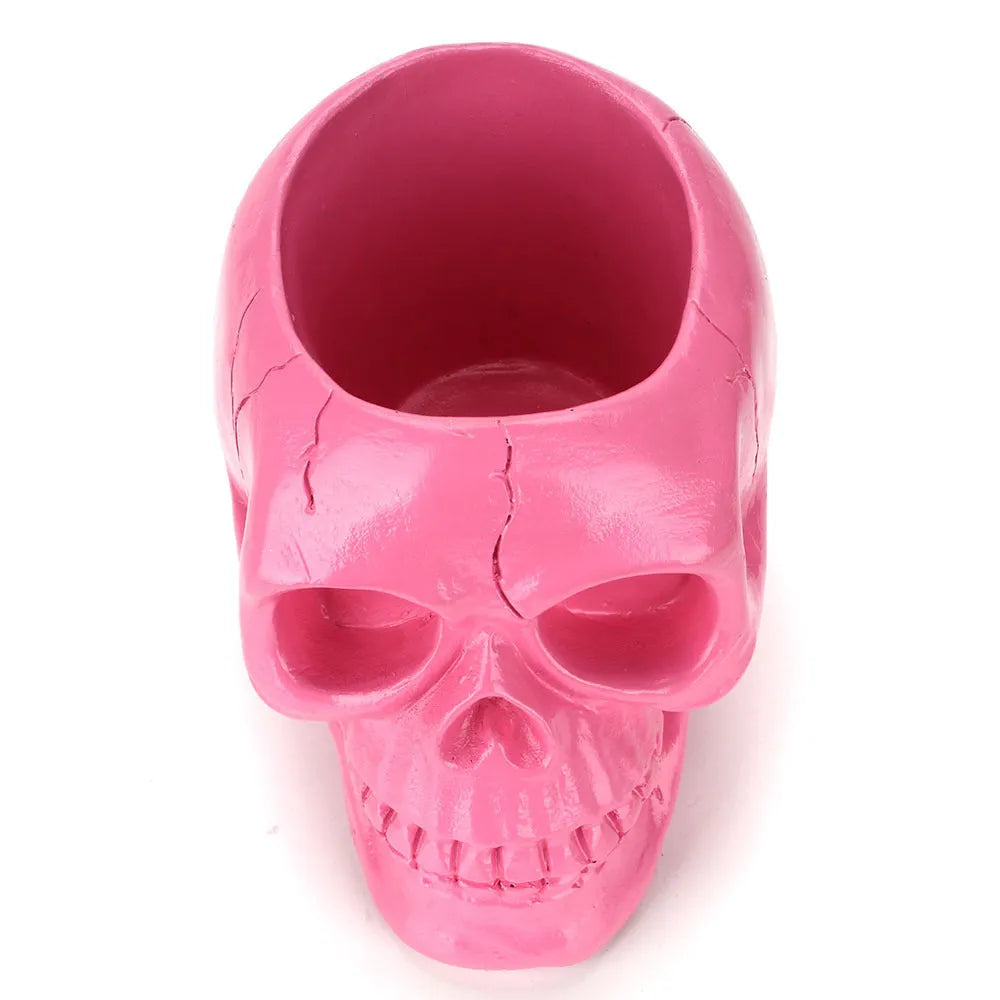 Skull head resin storage tube in black, 11x15x11cm, with open top showing inner 7cm diameter for storing beauty tools