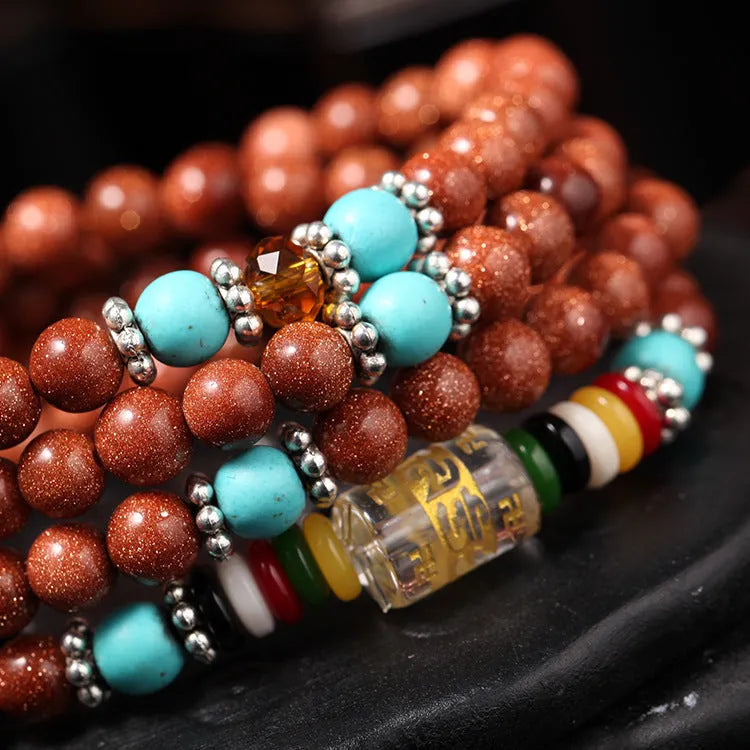 Golden star stone mantra bracelet with 108 nugget sand beads and retro fu character design