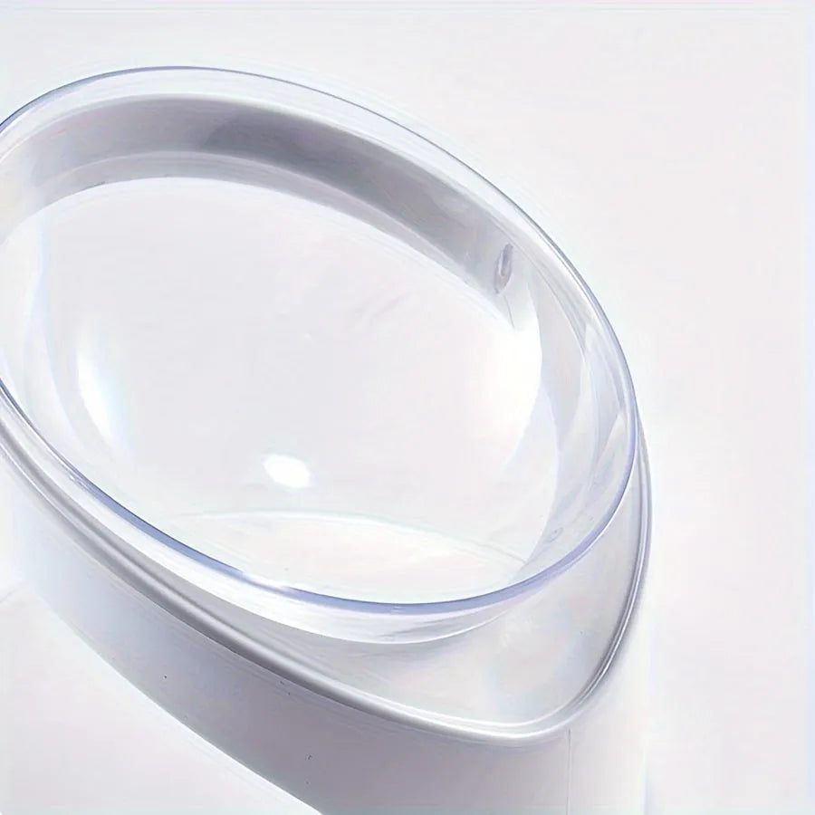 Clear plastic tilted cat food dish on a 7cm tall white plastic elevated base.