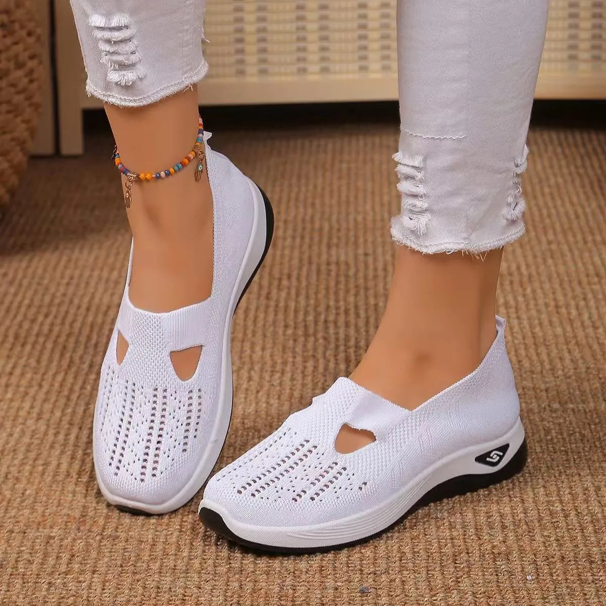 Women's casual mesh flat shoes with a T-bar strap and round toe in multiple colours.