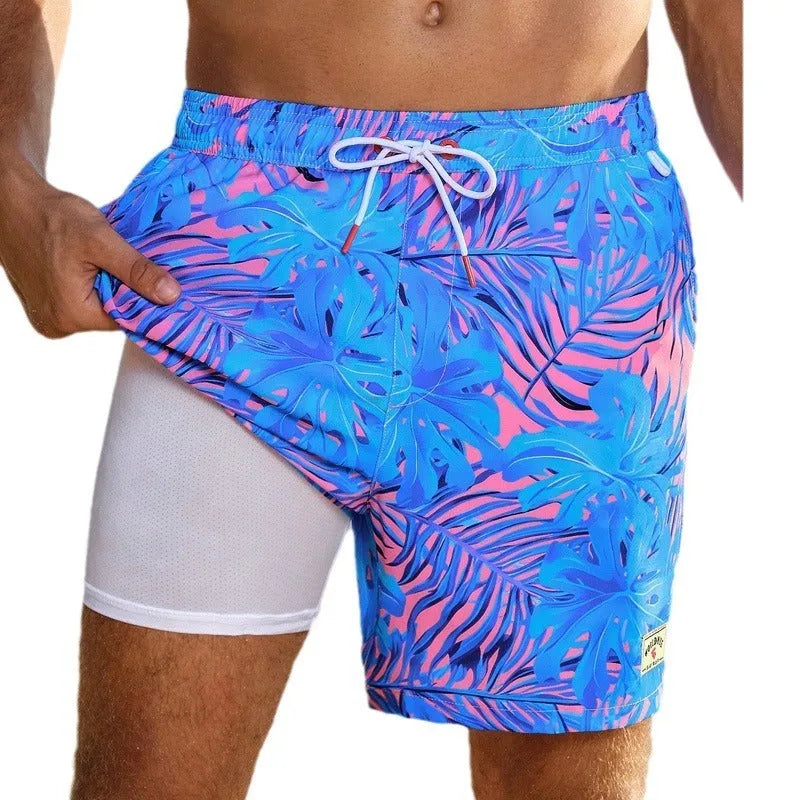 Men's loose swimming trunks with elastic waistband in multiple colour patterns including floral and aquatic designs