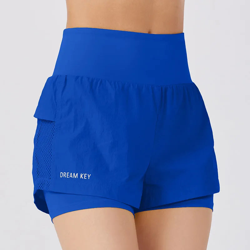 Women's loose casual cotton blend quick-drying sports shorts in multiple colours on a hanger.