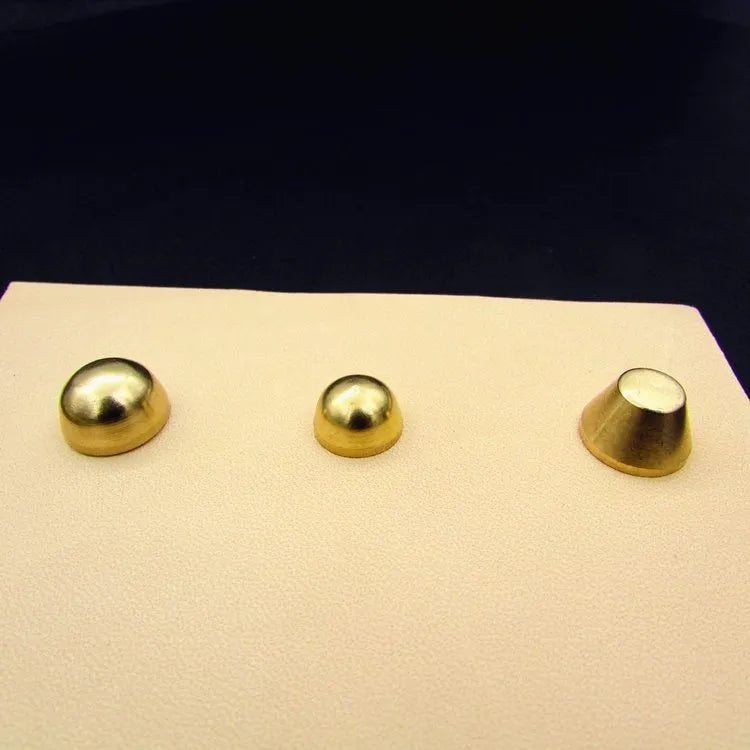 Brass decorative buckle with geometric and round foot nail designs in 10x6mm and 12x7mm sizes.