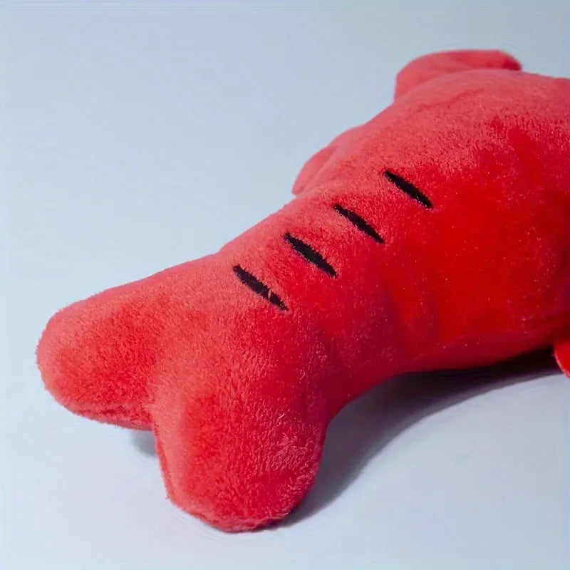 Red lobster stuffed squeaky dog toy for small medium breeds on white background