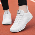 Women's flat board casual shoe with high-top design and back lacing in white colour