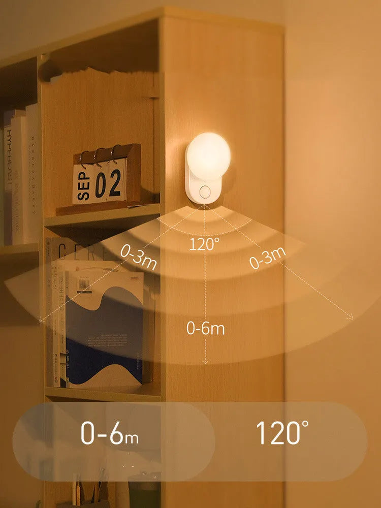 Baseus white rechargeable sensor night light with motion detection and USB charging port.