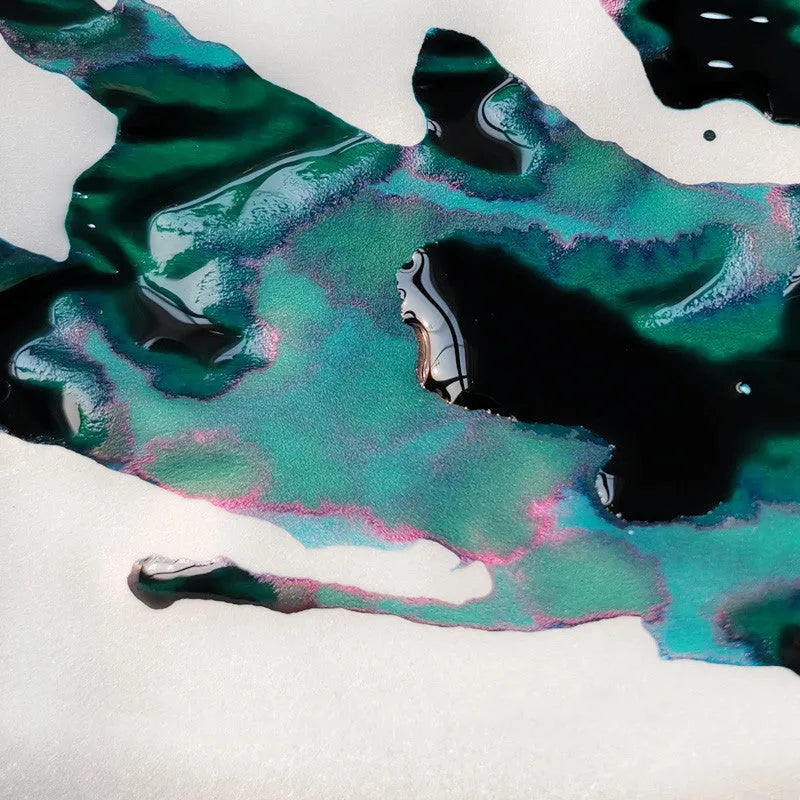 Bottle of gradient sheen ink with gold powder effects for fountain pens and dip pens