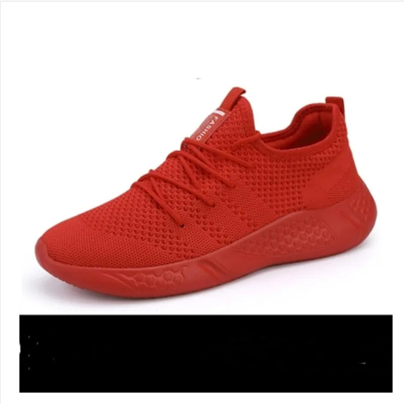 Men's black and white casual sneakers with breathable mesh upper and lace-up closure on a PVC sole.
