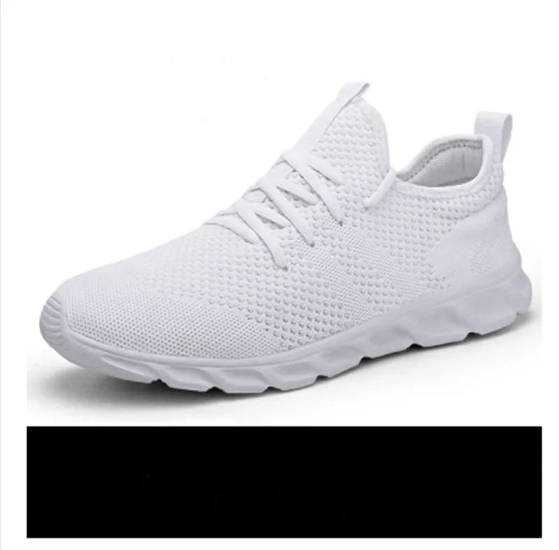 Men's black and white casual sneakers with breathable mesh upper and lace-up closure on a PVC sole.