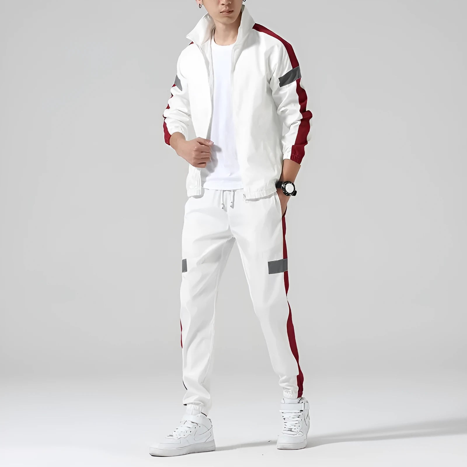Men's polyester sportswear suit with stand collar jacket and loose fit trousers in black