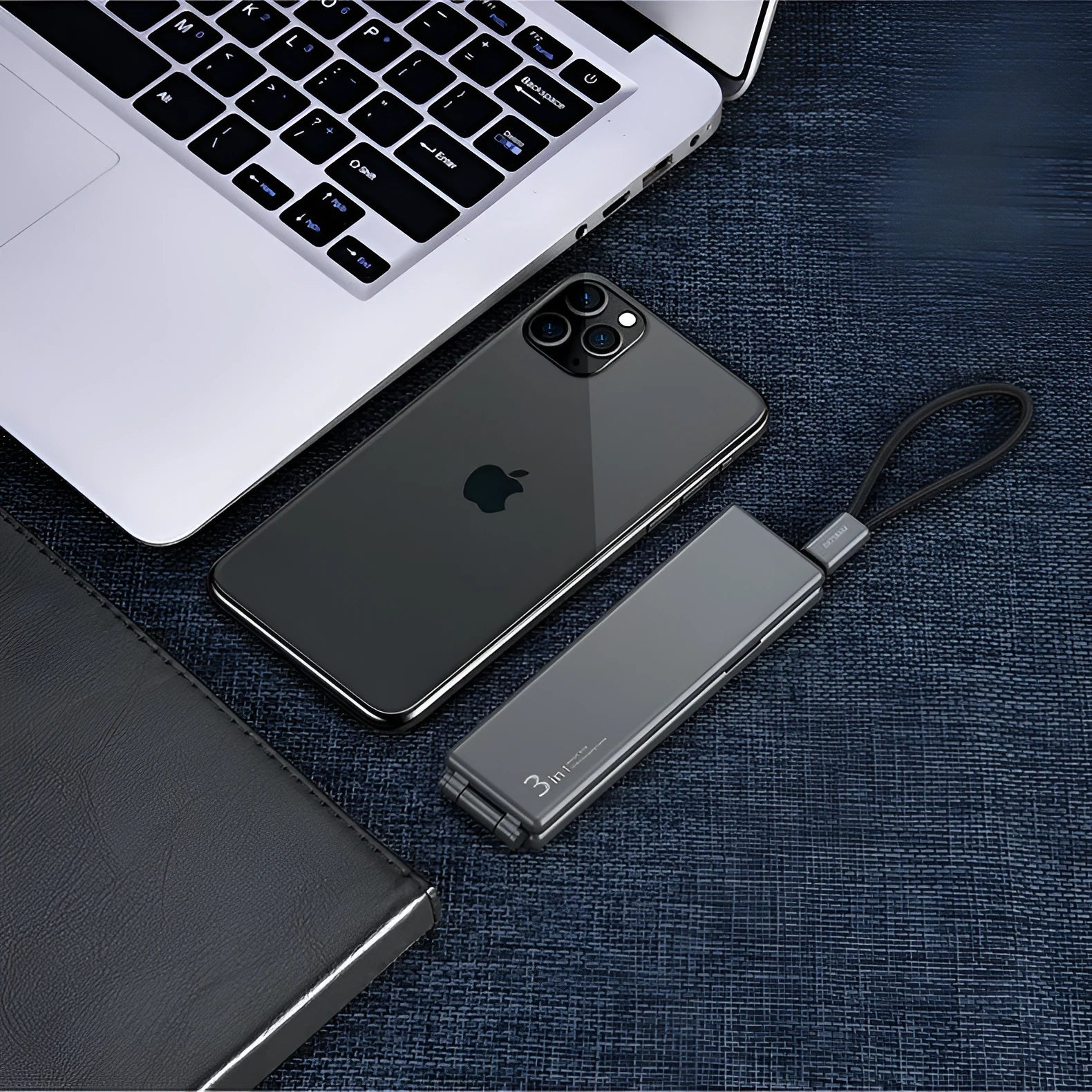 Multifunctional one-for-three charger cable in black with iPhone, Type-C, and Micro USB connectors