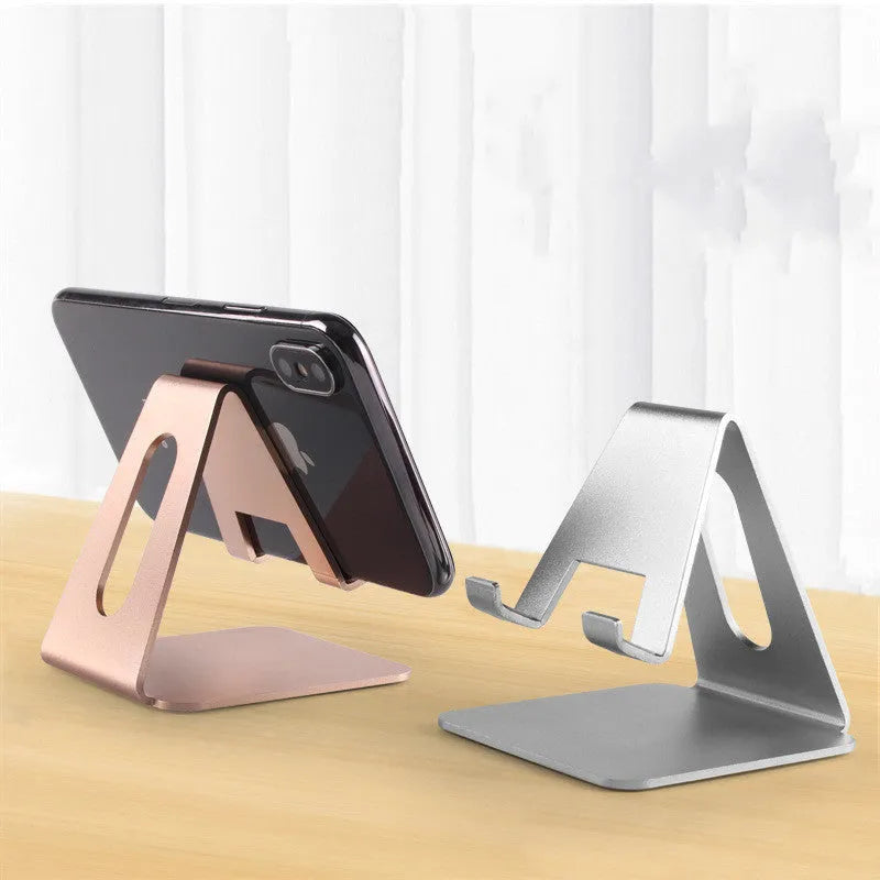 Metal desktop phone holder in black with adjustable arm compatible with Apple iPhone charging