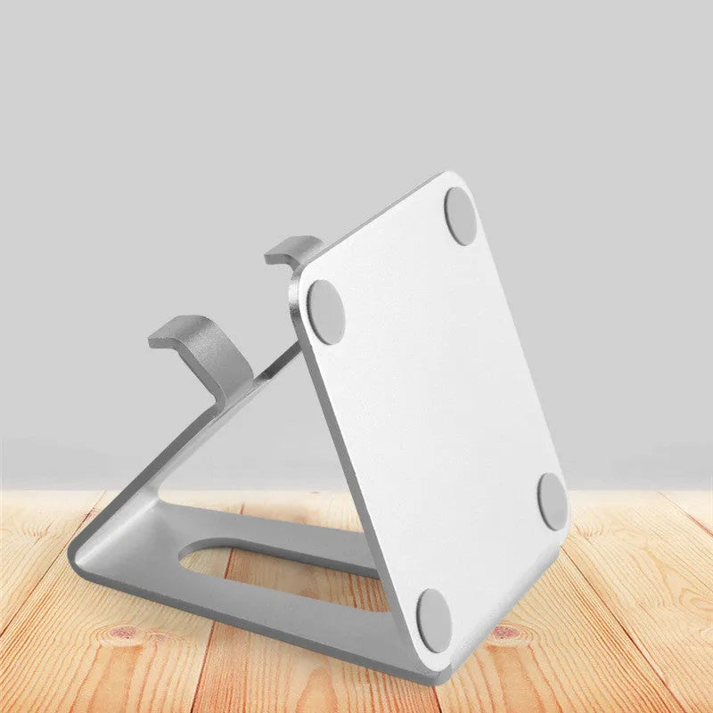 Metal desktop phone holder in black with adjustable arm compatible with Apple iPhone charging