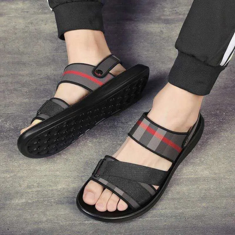 A pair of youth leisure sports sandals with a light blue Lycra upper and a polyurethane sole.