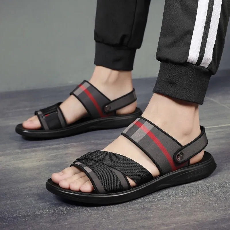 A pair of youth leisure sports sandals with a light blue Lycra upper and a polyurethane sole.