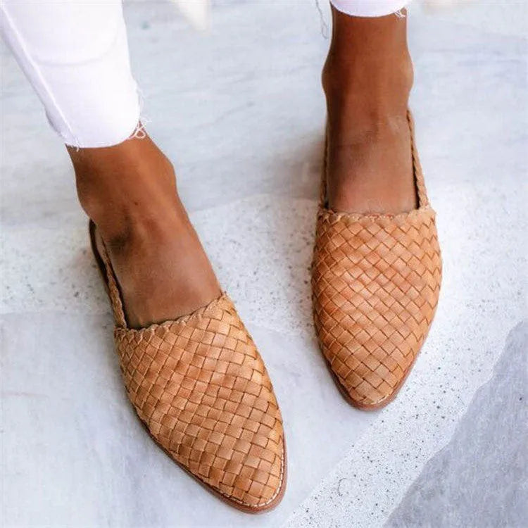 Women's buckle flat sandals with pointed toe in multiple colour options showing adjustable strap