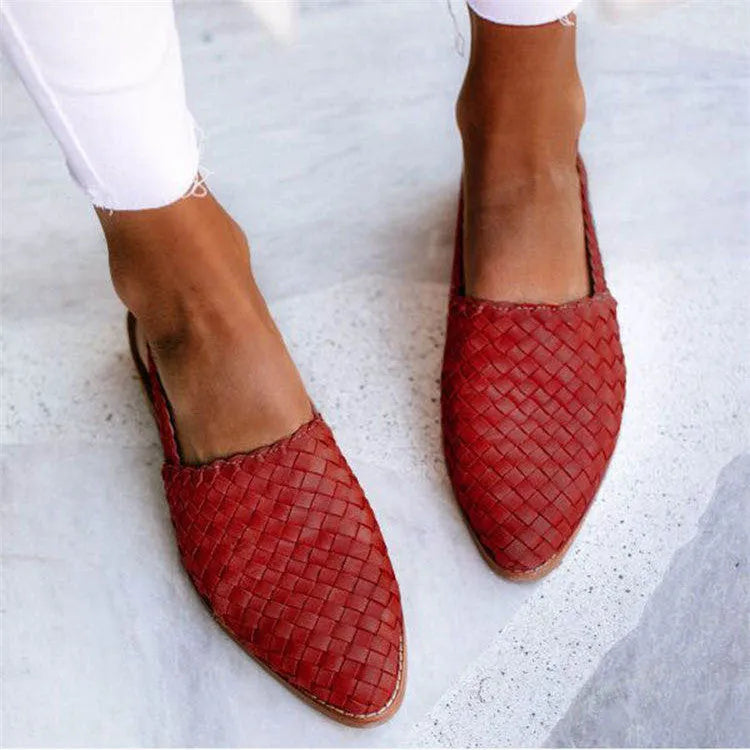 Women's buckle flat sandals with pointed toe in multiple colour options showing adjustable strap