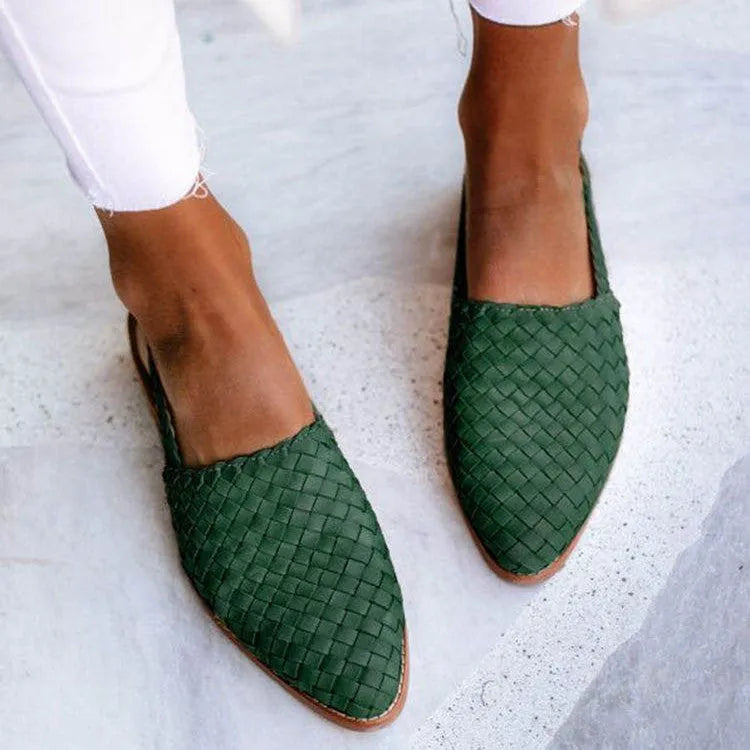 Women's buckle flat sandals with pointed toe in multiple colour options showing adjustable strap