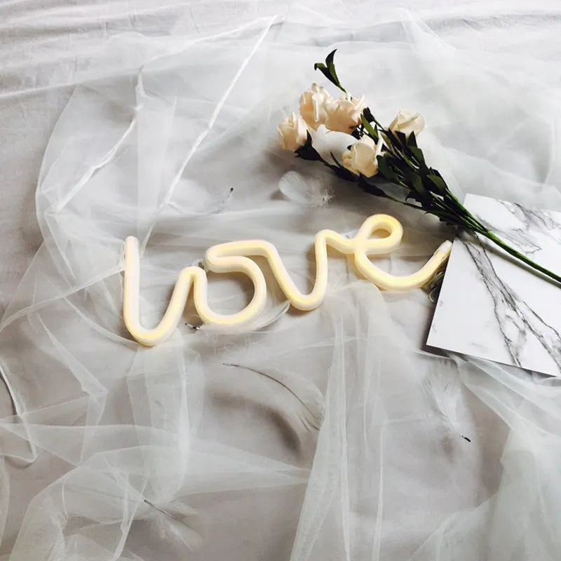 Pink love-shaped LED neon sign light with USB and battery power options for indoor decoration