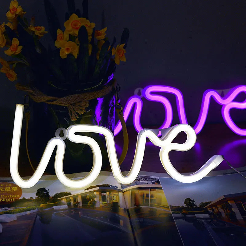 Pink love-shaped LED neon sign light with USB and battery power options for indoor decoration
