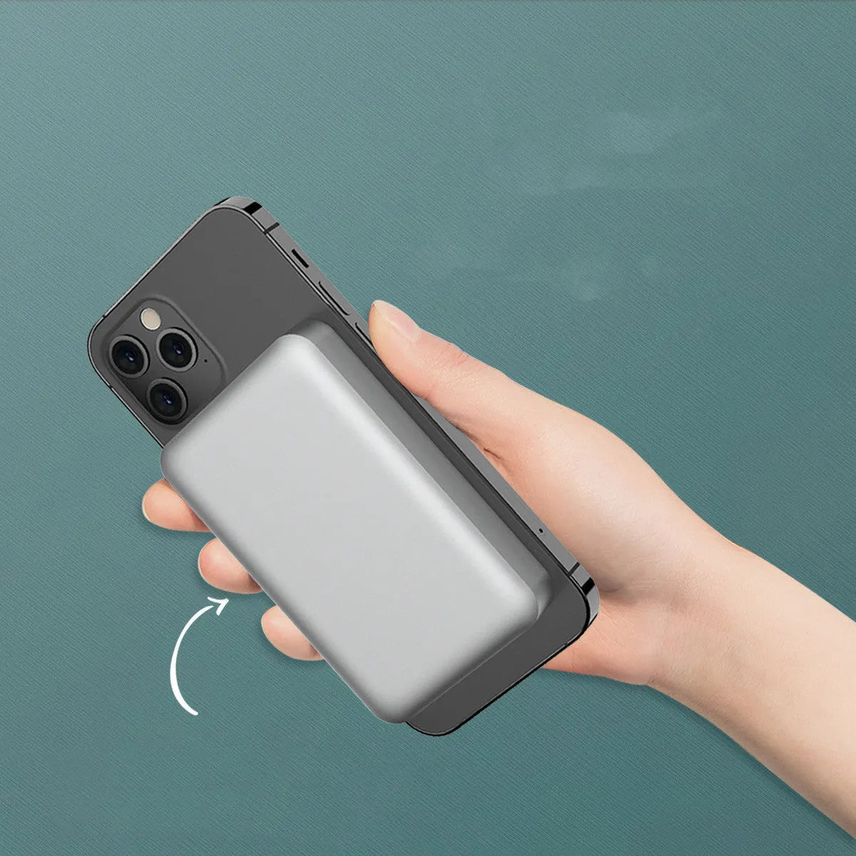 Silver aluminium magnetic wireless power bank for iPhone charging, showing slim profile.