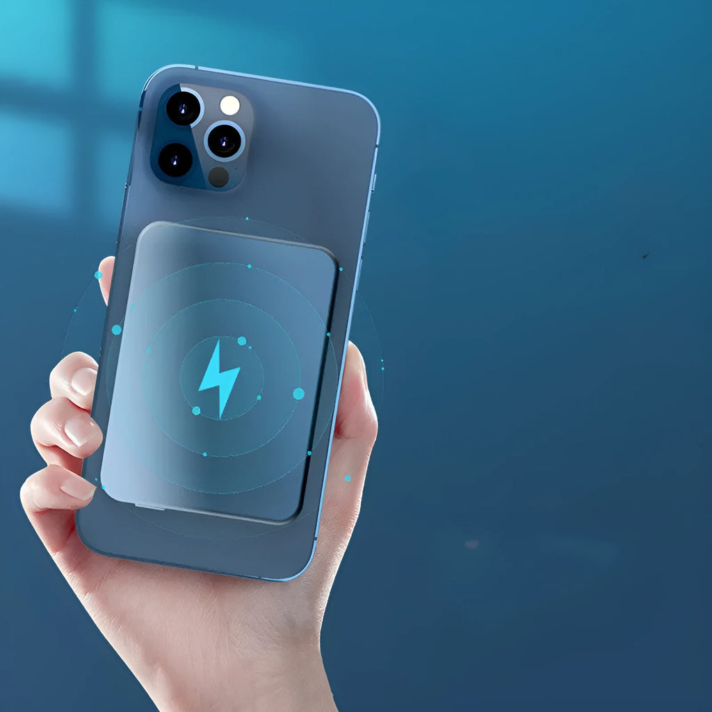 Silver aluminium magnetic wireless power bank for iPhone charging, showing slim profile.