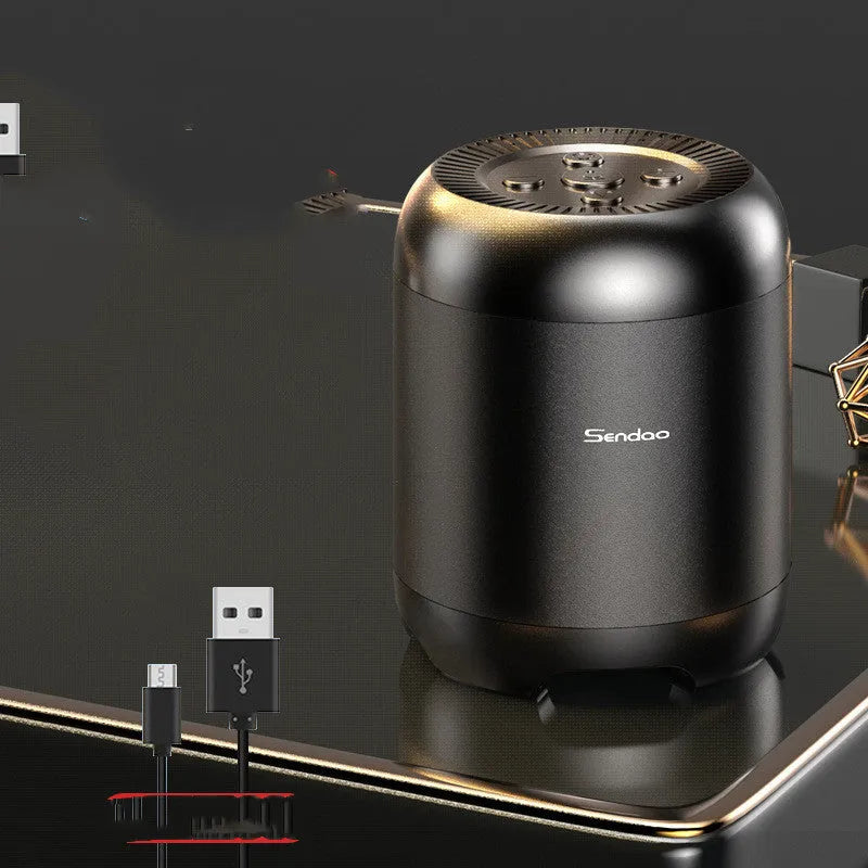 Compact black or white Bluetooth speaker with card reader slot and subwoofer grille