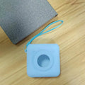 Portable mini thermal label printer in white, 7.9 x 7.9 x 4.2cm, with rechargeable battery and thermal paper roll