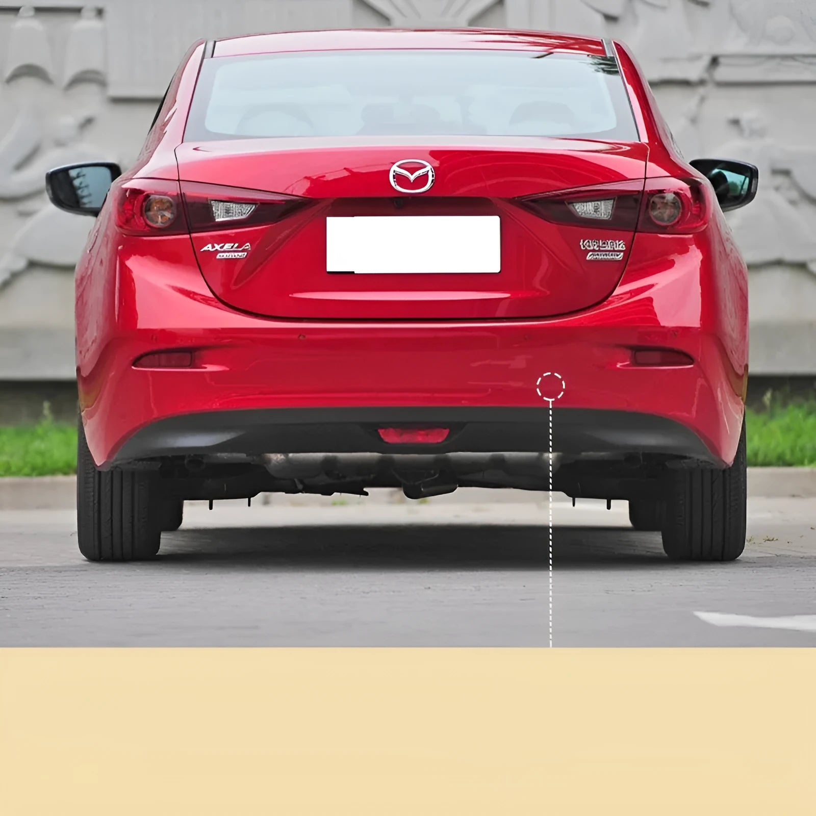 Mazda 3 Axela rear bumper trailer cover in Soul Red for sedan model