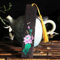 Traditional Chinese painted lotus sandalwood bookmark with polished finish and plant motif