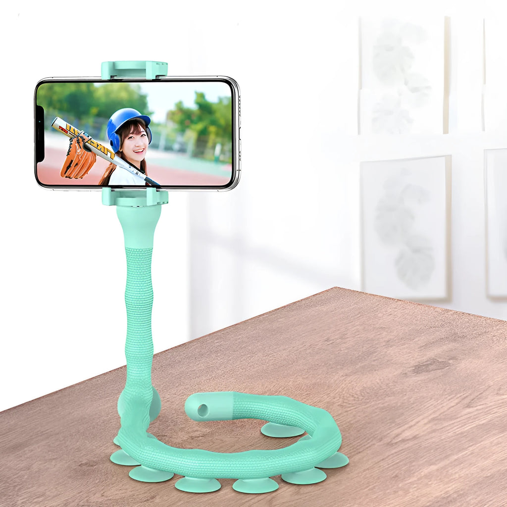 Flexible black rubber phone holder with suction cup extended, showing 360° rotation joint next to a mobile phone.