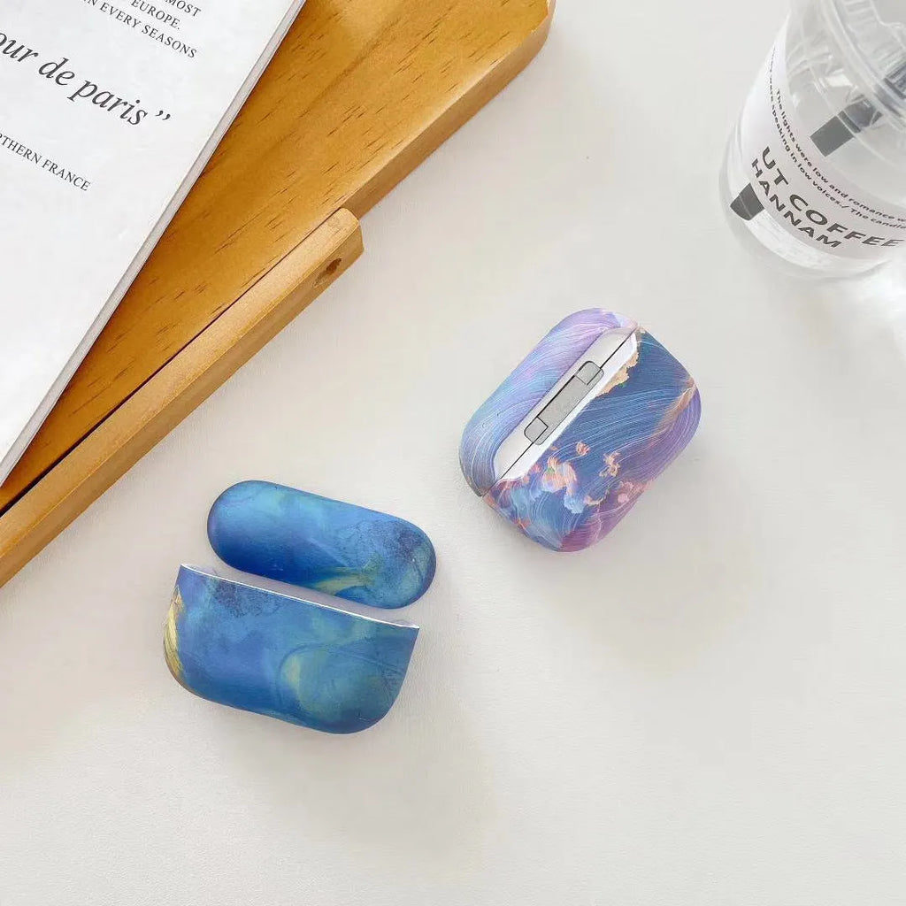 Pink and blue watercolour design hard plastic protective case for Apple AirPods Pro, AirPods 1, and AirPods 2.