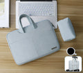 Blue PU leather laptop bag open to show internal organiser pockets for computer and phone.