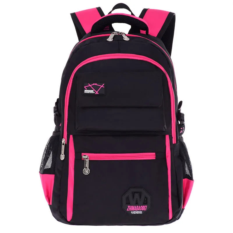 Green waterproof nylon school bag for students with multiple compartments on a white background.