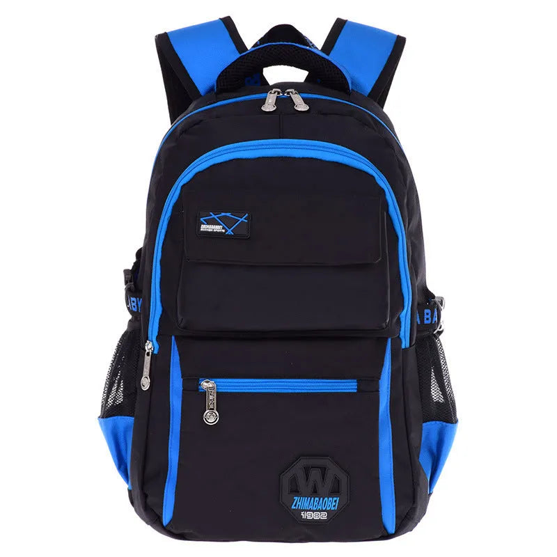 Green waterproof nylon school bag for students with multiple compartments on a white background.