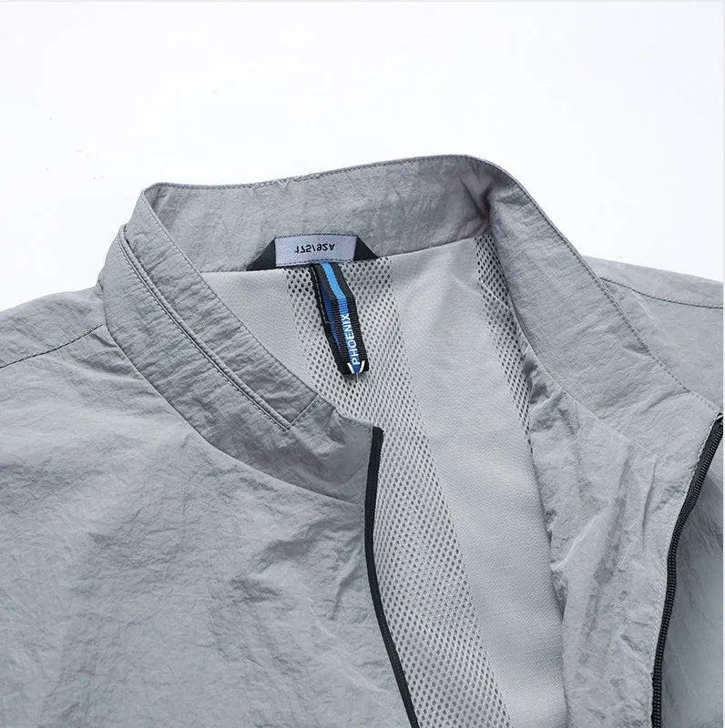 Kentino men's UPF50+ sunscreen shirt in lightweight polyester fabric, available in blue, grey, navy colours