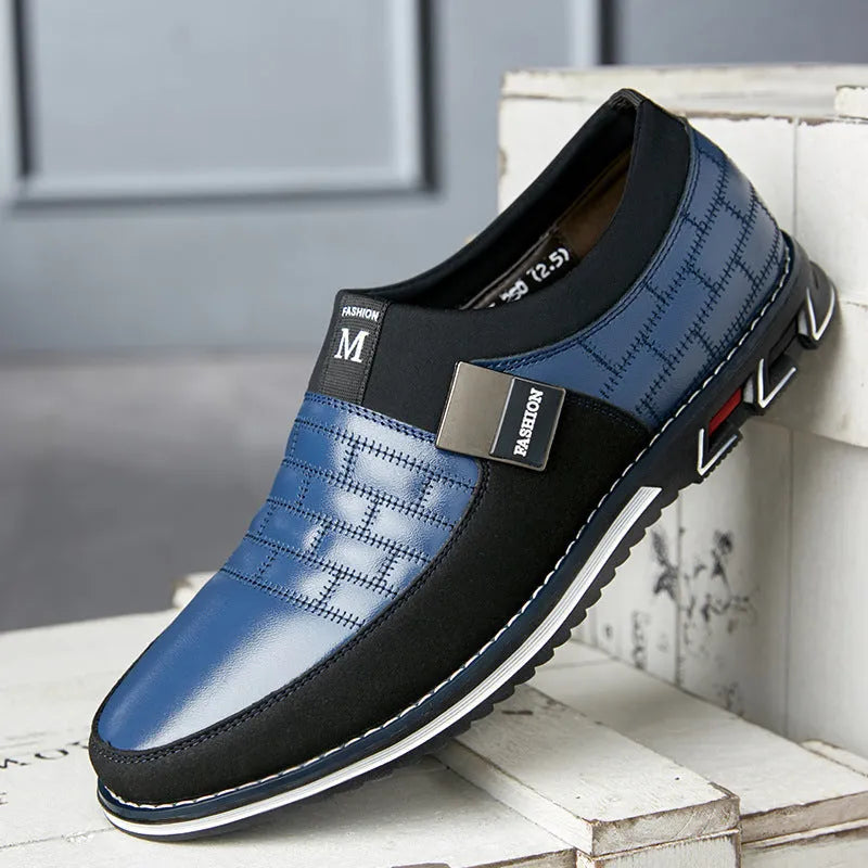 Men's black casual leather low-top shoes showing side profile on a white background.