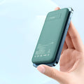 Maiduo Magsafe magnetic wireless power bank in mint green with dimensions 15.5cm by 7.5cm by 1.55cm