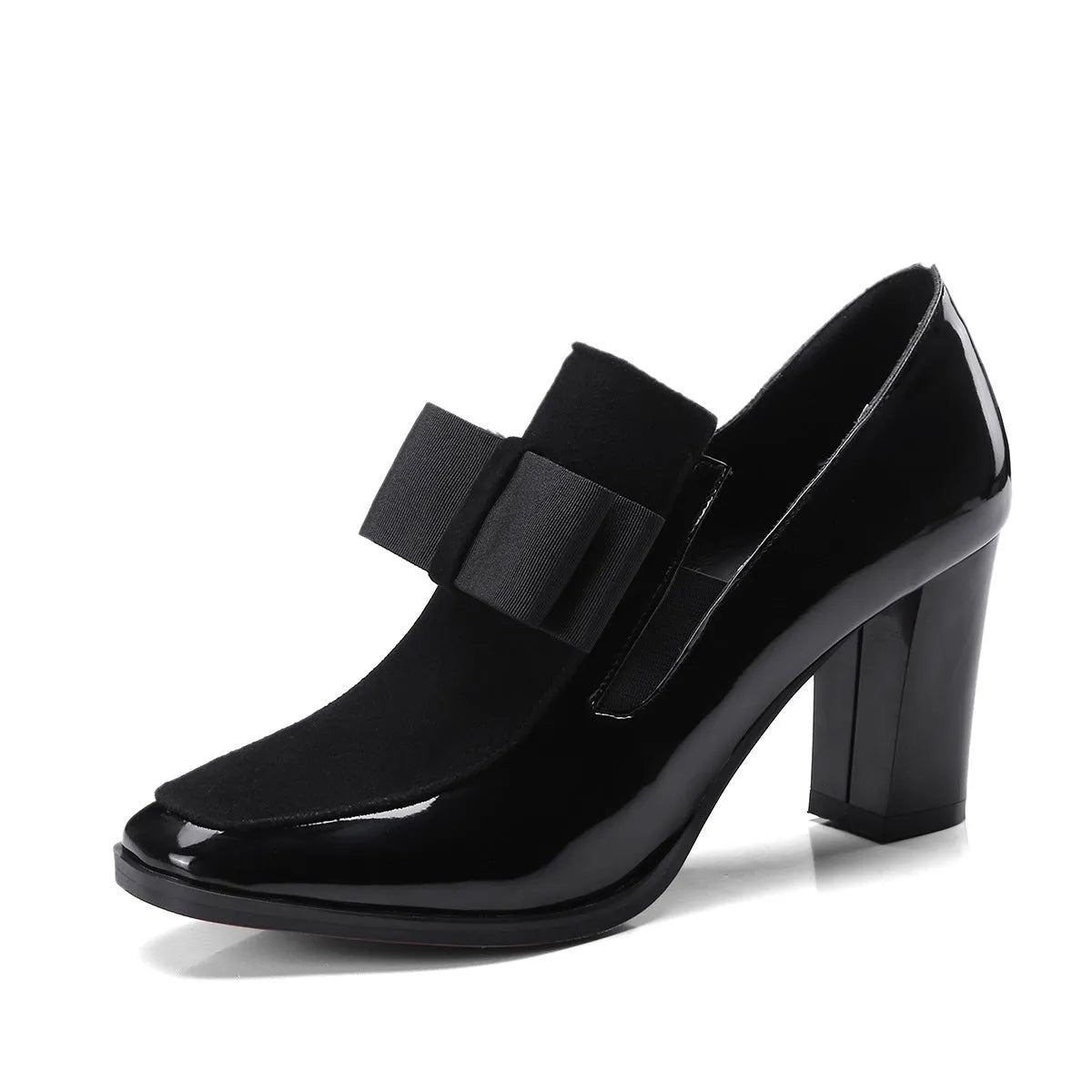 Black patent leather women's high heels with a thick square heel and rubber sole.