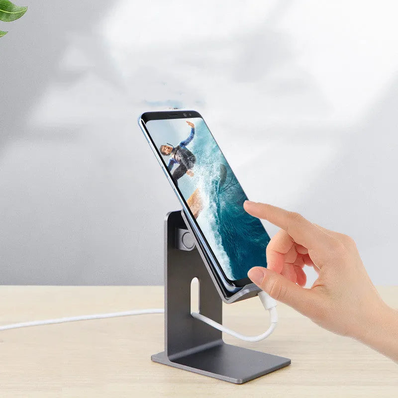 Dark gray alloy desktop stand holding a mobile phone at an angle