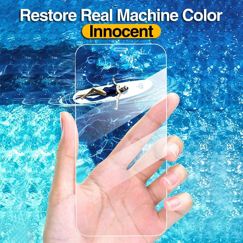 Four transparent tempered glass screen protectors for iPhone models on a clean surface.
