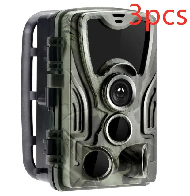 Green cellular trail game camera showing front lens and display, dimensions 135x90x76mm