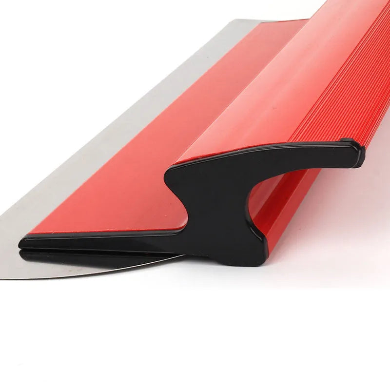Red leveling scraper tool with a 40cm long steel blade for wall putty and wallpaper paste.