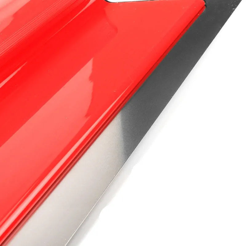 Red leveling scraper tool with a 40cm long steel blade for wall putty and wallpaper paste.