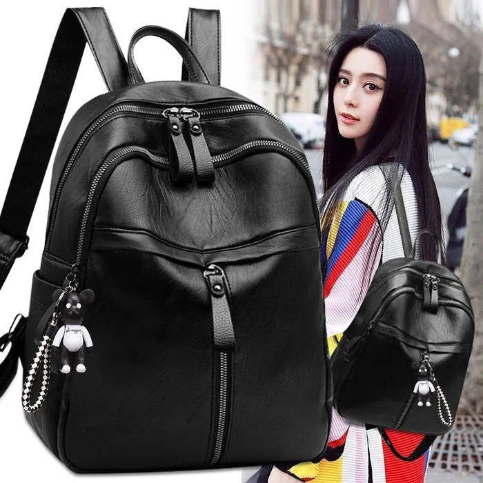 Black PU leather backpack with double straps showing ID compartment organisation