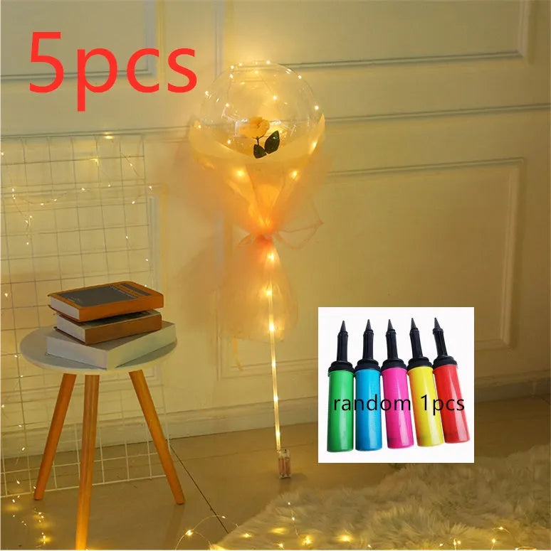 Transparent LED luminous balloon with artificial rose and built-in light, shown as a DIY bouquet kit.