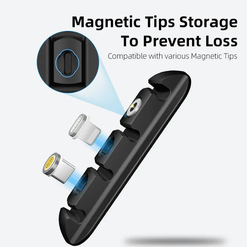 Black soft plastic magnetic cable organiser for desktop charging cable storage.